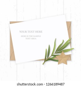 Flat lay top view elegant white composition paper kraft envelope star shape craft and tarragon leaf on wooden background.