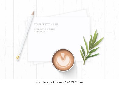 Flat lay top view elegant white composition paper nature leaf coffee tarragon leaf and pencil on wooden background.