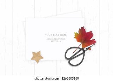 Flat lay top view elegant white composition paper vintage metal scissors autumn maple leaf and star shape craft object on wooden background.