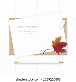 Flat lay top view elegant white composition paper kraft envelope pencil autumn maple leaf and eraser on wooden background.