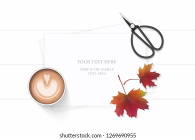 Flat lay top view elegant white composition paper coffee autumn maple leaf and vintage metal scissors on wooden background.