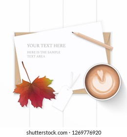 Flat lay top view elegant white composition paper kraft envelope tag autumn maple leaf pencil and coffee on wooden background.