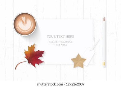 Flat lay top view elegant white composition paper pencil star craft tag autumn maple leaf and coffee on wooden background.
