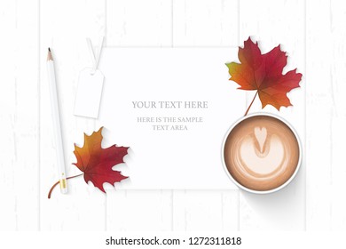 Flat lay top view elegant white composition paper pencil eraser autumn maple leaf tag and coffee on wooden background.