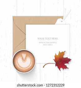 Flat lay top view elegant white composition paper brown kraft envelope autumn maple leaf tag and coffee on wooden background.