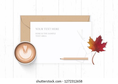 Flat lay top view elegant white composition letter kraft paper envelope pencil coffee autumn maple leaf and tags on wooden background.