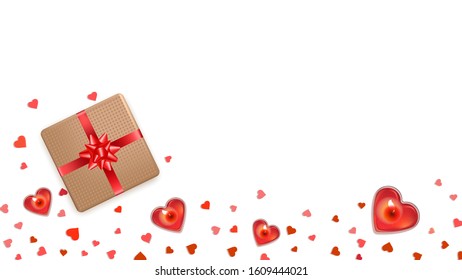 Flat lay Valentines Day background with red hearts. Candles in form of heart and gifts with ribbon bow on wooden table. Romantic template design for greeting card, wedding, banners, posters. Top view