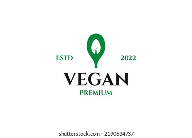 Logo plano para vegano con idea de ilustración de diseño de cuchara y hoja