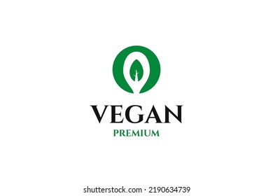 Flat logo for vegan with spoon and leaf design illustration idea