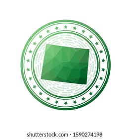 Flat low poly stamp of Wyoming. Polygonal Wyoming badge. Trendy vector logo of the us state.