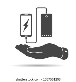 Flat minimal design graphic image concept of  hand showing phone charging from portable battery or powerbank icon on white background
