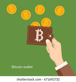Flat modern design concept of cryptocurrency technology, bitcoin exchange, bitcoin mining, e-wallet. Hand holding wallet with raining bitcoins. EPS 10