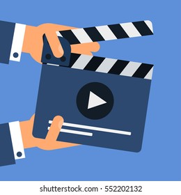 Flat movie clapperboard symbol in hands. Stylish blank movie clapperboard elements. Vector