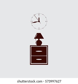 Flat nightstand with clock and lamp. 