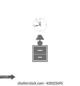 Flat nightstand with clock and lamp. Living room.Bedside table.