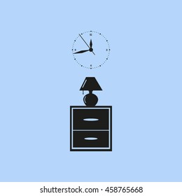 Flat nightstand with clock and lamp. Living room.Bedside table.