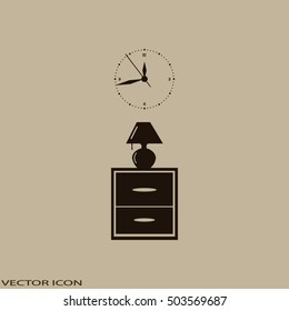 Flat nightstand with clock and lamp. Living room.Bedside table.