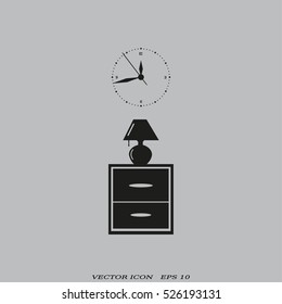 Flat nightstand with clock and lamp. Living room.Bedside table.