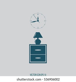 Flat nightstand with clock and lamp. Living room.Bedside table.