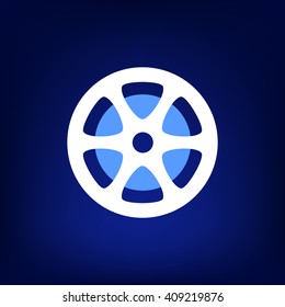 Flat paper cut style icon of old tape spool. Vector illustration
