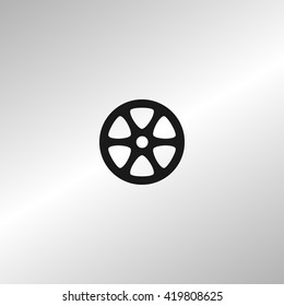 Flat paper cut style icon of old tape spool. Vector illustration