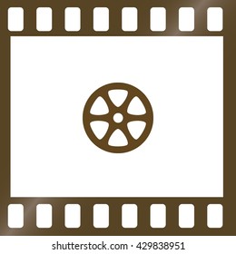 Flat paper cut style icon of old tape spool. Vector illustration