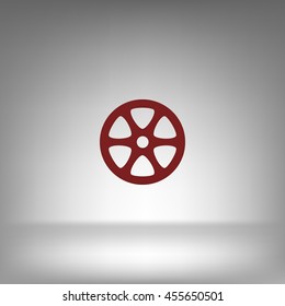 Flat paper cut style icon of old tape spool. Vector illustration