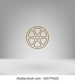 Flat paper cut style icon of old tape spool. Vector illustration