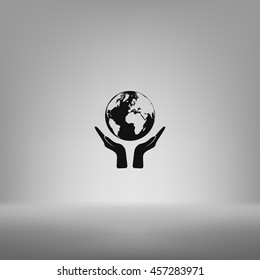 Flat paper cut style icon of two hands holding Earth. Vector illustration