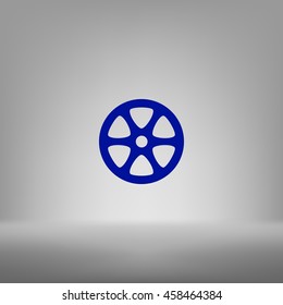 Flat paper cut style icon of old tape spool. Vector illustration
