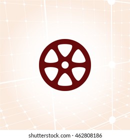Flat paper cut style icon of old tape spool. Vector illustration