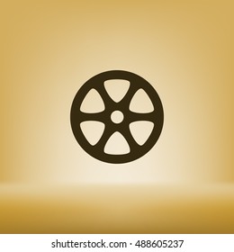 Flat paper cut style icon of old tape spool. Vector illustration