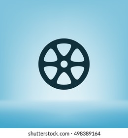Flat paper cut style icon of old tape spool. Vector illustration