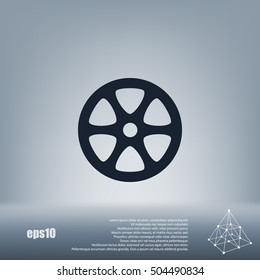 Flat paper cut style icon of old tape spool. Vector illustration