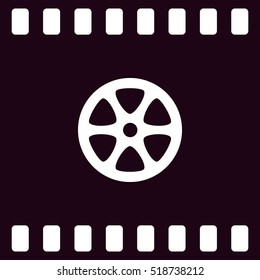Flat paper cut style icon of old tape spool. Vector illustration