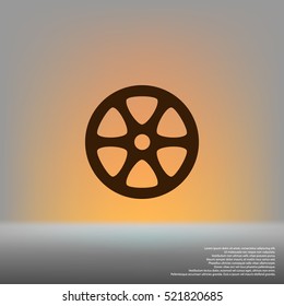 Flat paper cut style icon of old tape spool. Vector illustration