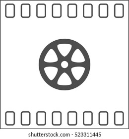 Flat paper cut style icon of old tape spool. Vector illustration