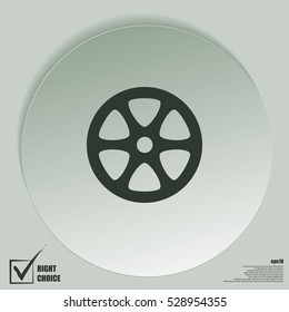 Flat paper cut style icon of old tape spool. Vector illustration