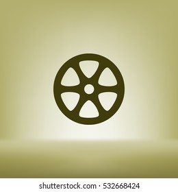 Flat paper cut style icon of old tape spool. Vector illustration