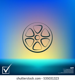 Flat paper cut style icon of old tape spool. Vector illustration