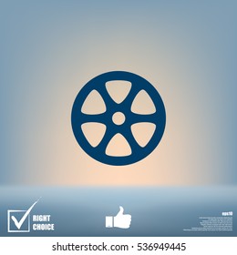 Flat paper cut style icon of old tape spool. Vector illustration
