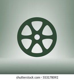 Flat paper cut style icon of old tape spool. Vector illustration