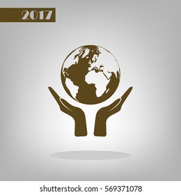 Flat paper cut style icon of two hands holding Earth. Vector illustration