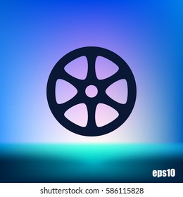 Flat paper cut style icon of old tape spool. Vector illustration