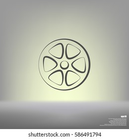 Flat paper cut style icon of old tape spool. Vector illustration