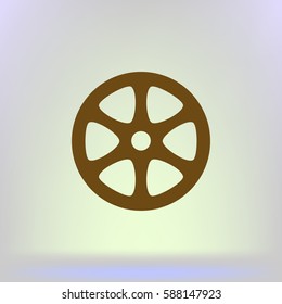 Flat paper cut style icon of old tape spool. Vector illustration