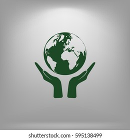 Flat paper cut style icon of two hands holding Earth. Vector illustration