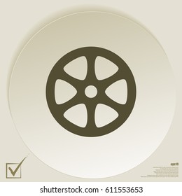 Flat paper cut style icon of old tape spool. Vector illustration