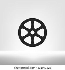 Flat paper cut style icon of old tape spool. Vector illustration