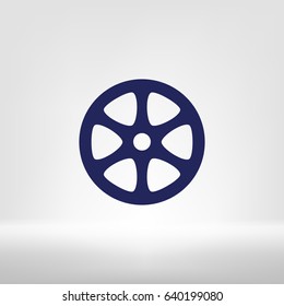 Flat paper cut style icon of old tape spool. Vector illustration